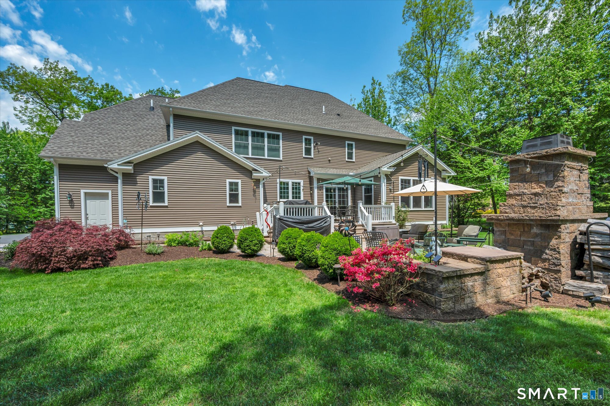 16 Sweetheart Mountain Road Canton, CT 06019 - Photo 36 of 40 a front view of a house with garden