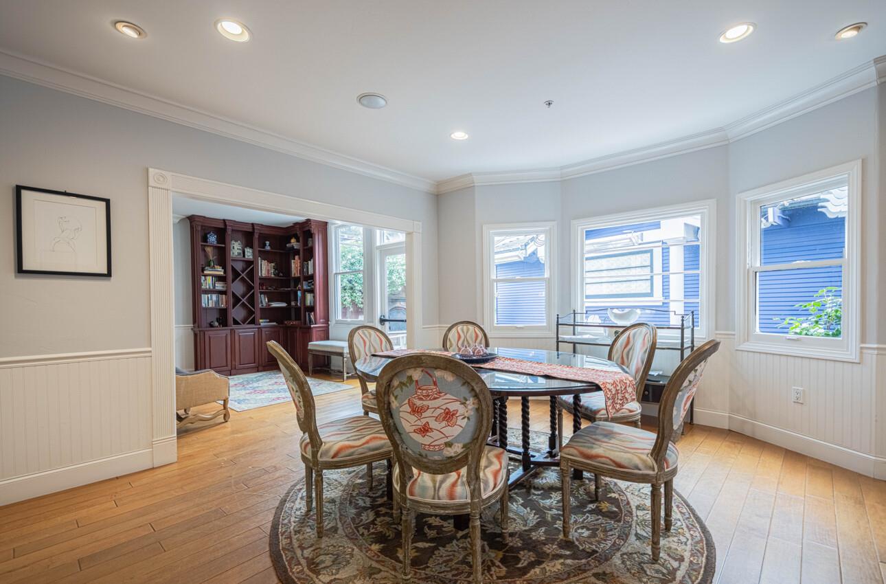 157 15th Street Pacific Grove, CA 93950 - Photo 11 of 41 a view of a dining room with furniture window and wooden floor
