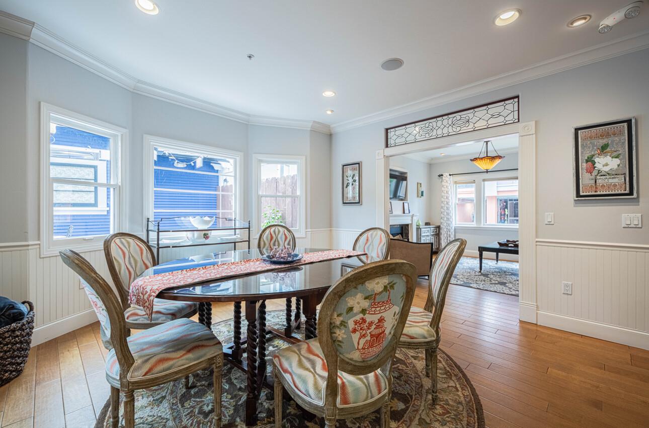 157 15th Street Pacific Grove, CA 93950 - Photo 12 of 41 a view of a dining room with furniture window and wooden floor
