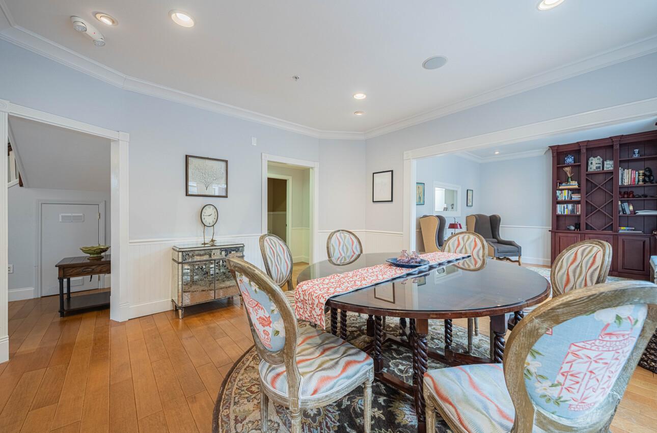 157 15th Street Pacific Grove, CA 93950 - Photo 13 of 41 a view of a dining room with furniture and wooden floor