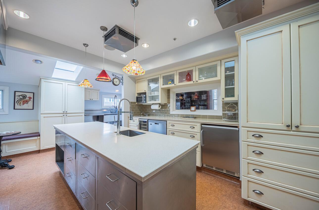 157 15th Street Pacific Grove, CA 93950 - Photo 16 of 41 a kitchen with a sink stove and refrigerator