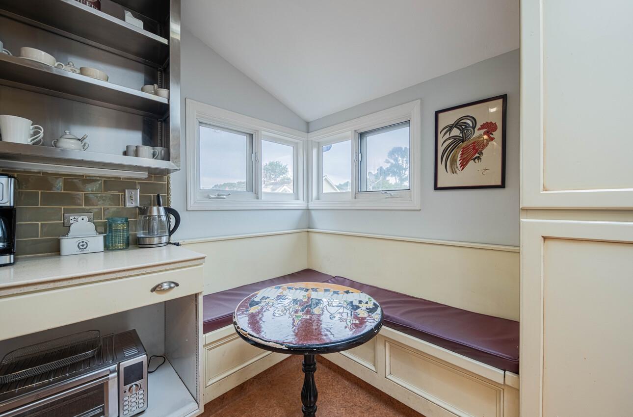 157 15th Street Pacific Grove, CA 93950 - Photo 20 of 41 a view of a room with a piano and wooden floor