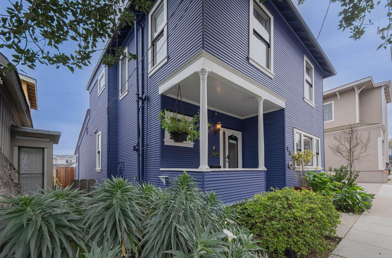 157 15th Street Pacific Grove, CA 93950 - Photo 3 of 41 a view of a building with a garden