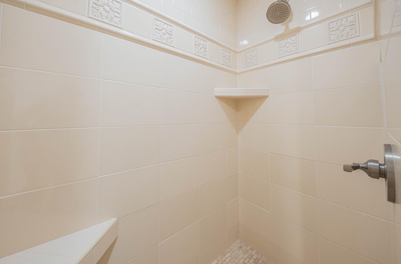 157 15th Street Pacific Grove, CA 93950 - Photo 38 of 41 a bathroom with a shower and a shower