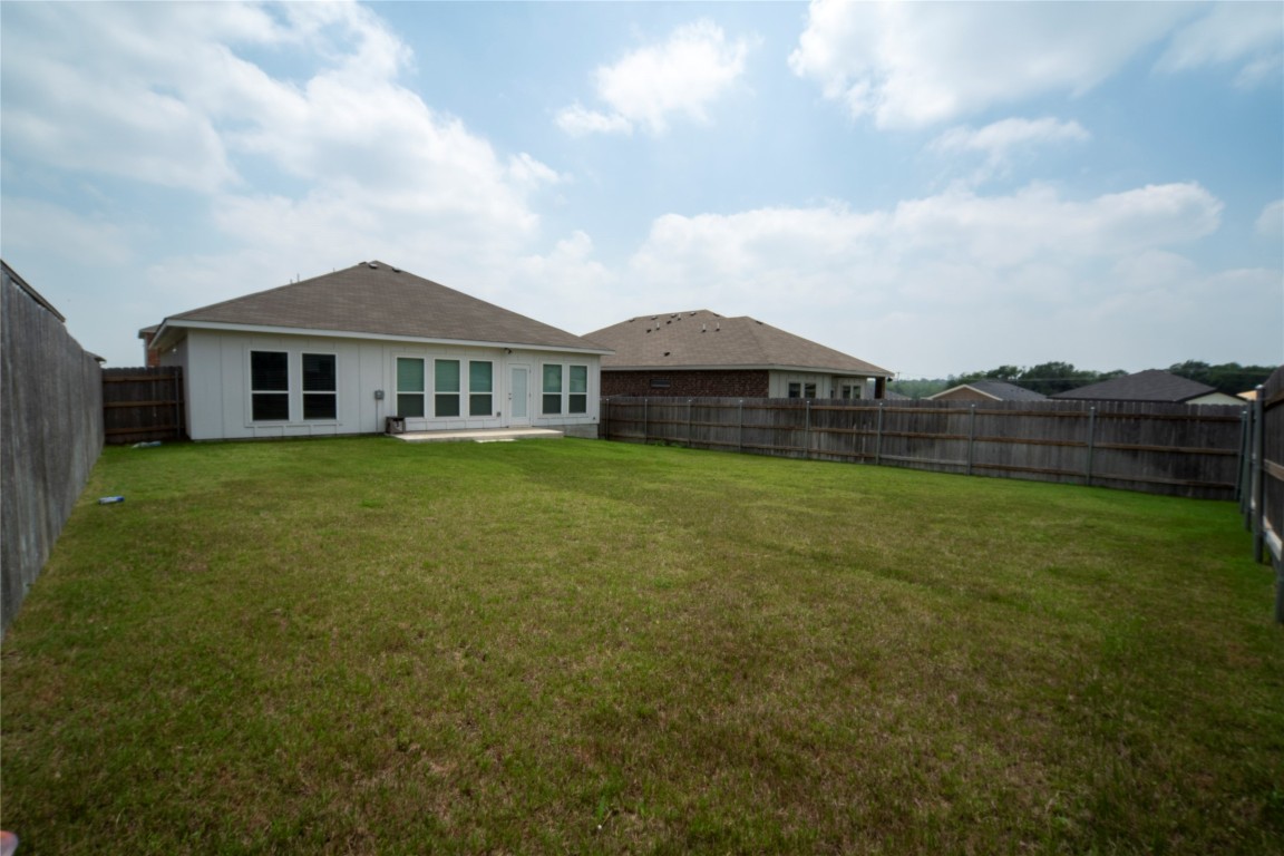 2208 Chia Court Temple, TX 76501 - Photo 13 of 16 a view of a house with a big yard and large trees