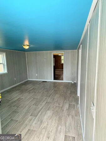 a view of an empty room and window