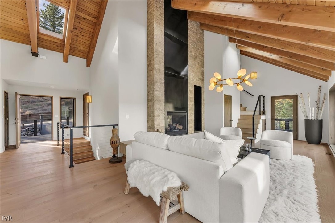 877 Tyner Way Incline Village, NV 89451 - Photo 5 of 43 a living room with furniture and a chandelier
