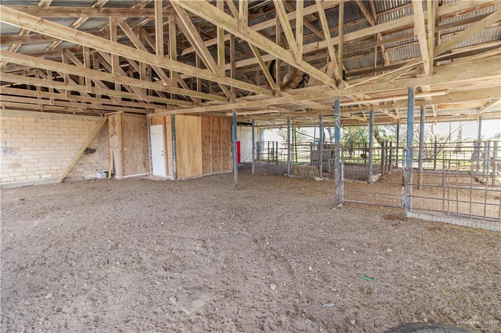 0 Mile 4 1/2 West Road West Weslaco, TX 78596 - Photo 8 of 16 a view of an empty room with windows