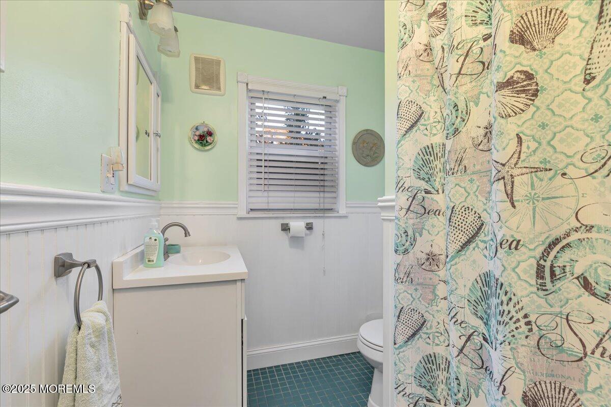 1211 18th Avenue West Belmar, NJ 07719 - Photo 17 of 40 a bathroom with a sink toilet and shower