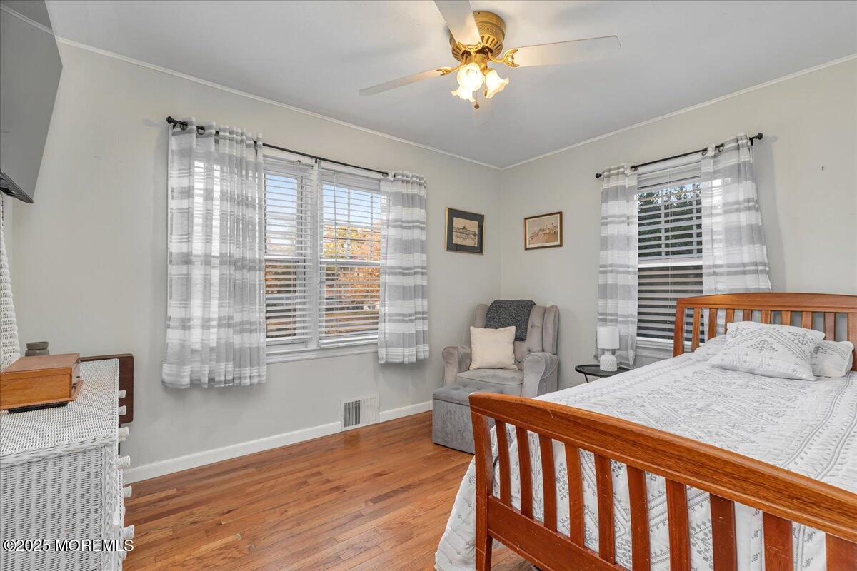 1211 18th Avenue West Belmar, NJ 07719 - Photo 18 of 40 a view of a dining room with furniture window and wooden floor