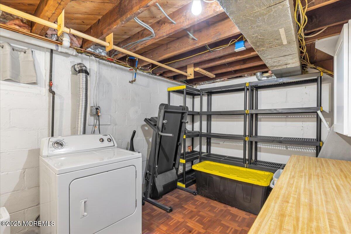 1211 18th Avenue West Belmar, NJ 07719 - Photo 25 of 40 a view of storage and utility room with washer and dryer