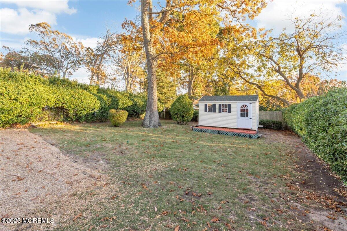 1211 18th Avenue West Belmar, NJ 07719 - Photo 31 of 40 a view of a house with a yard