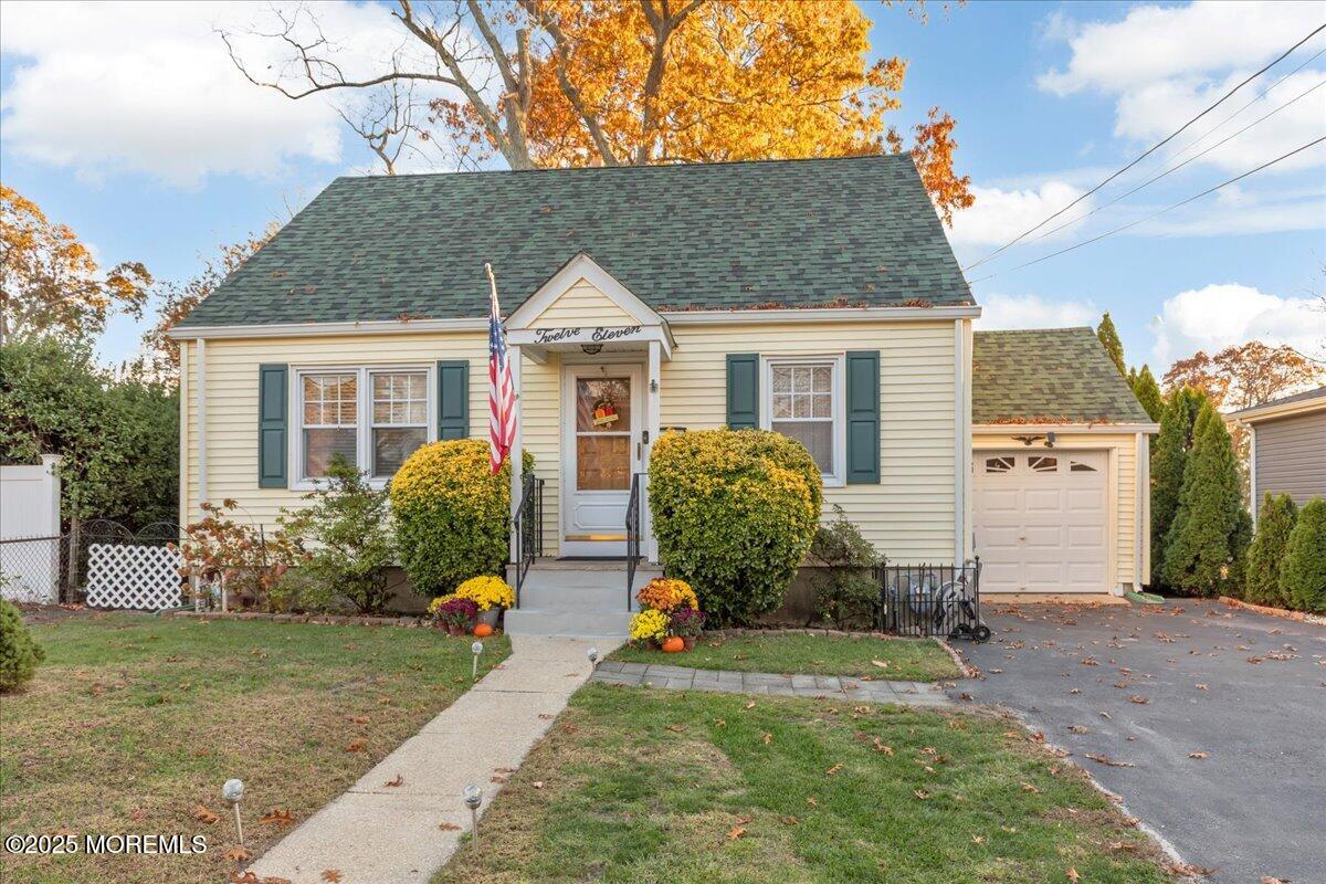 1211 18th Avenue West Belmar, NJ 07719 - Photo 4 of 40 front view of a house with a yard