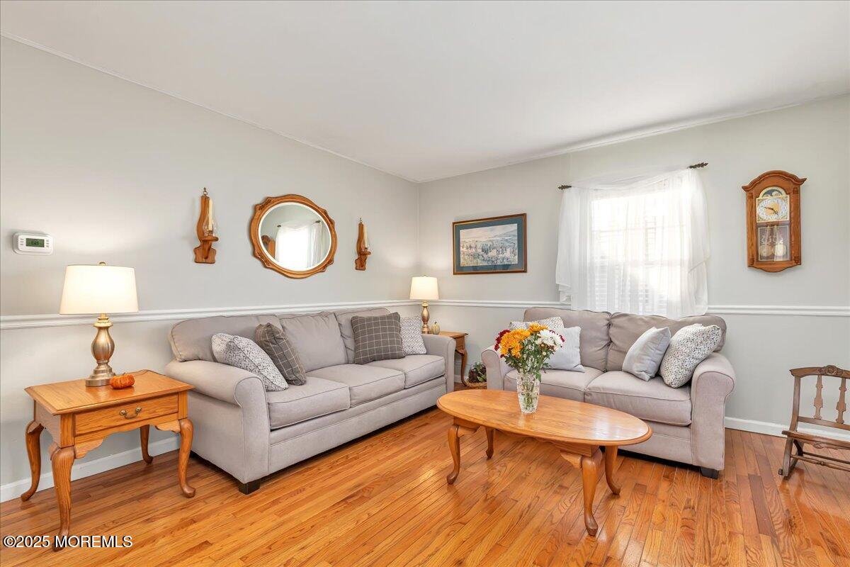 1211 18th Avenue West Belmar, NJ 07719 - Photo 5 of 40 a living room with furniture and wooden floor