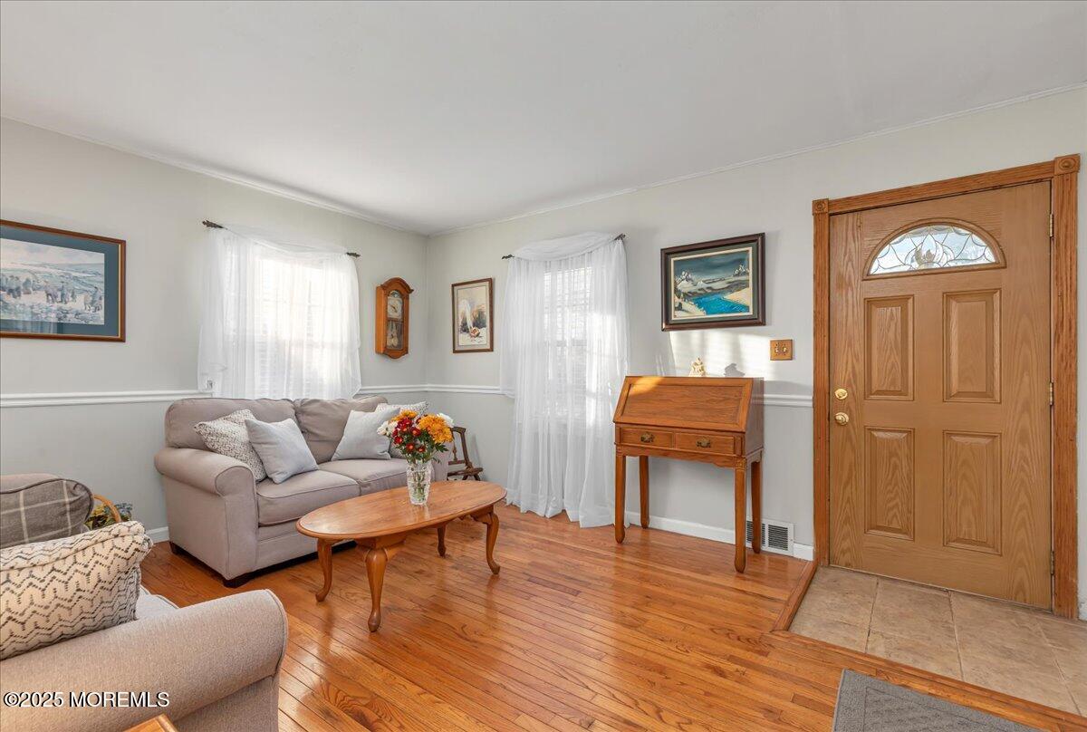 1211 18th Avenue West Belmar, NJ 07719 - Photo 6 of 40 a living room with furniture and a wooden floor