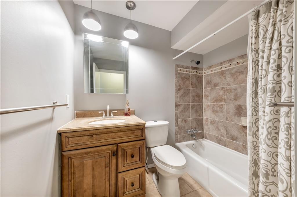 290 Bradys Ridge Road Beaver, PA 15009 - Photo 13 of 23 a bathroom with a sink toilet and shower