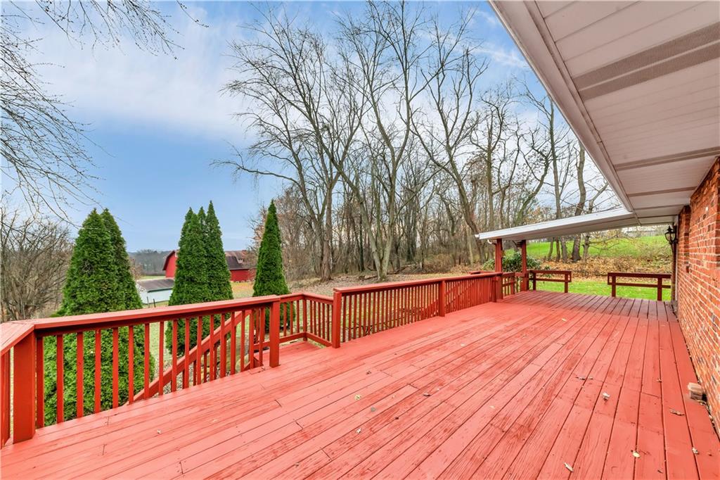 290 Bradys Ridge Road Beaver, PA 15009 - Photo 19 of 23 a view of backyard with deck and wooden floor