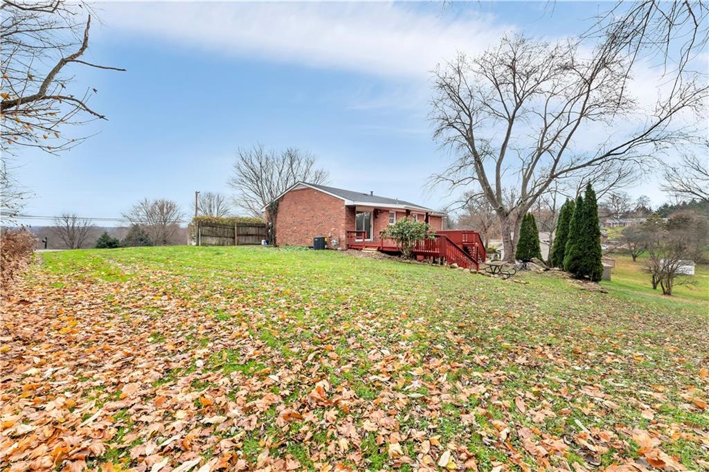 290 Bradys Ridge Road Beaver, PA 15009 - Photo 21 of 23 a view of a house with a yard
