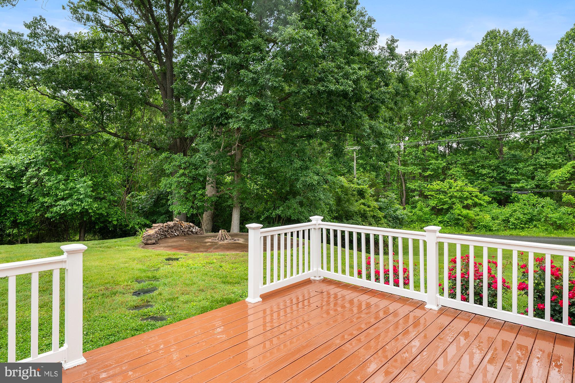 328 West Bay Front Road Lothian, MD 20711 - Photo 45 of 46 a view of a wooden deck and a yard