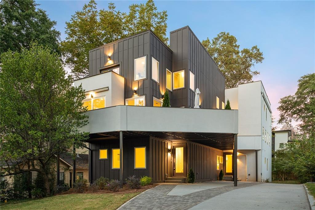 1205 Holly Street Northwest, Unit A Atlanta, GA 30318 - Photo 1 of 74 a view of a house that has a lot of windows