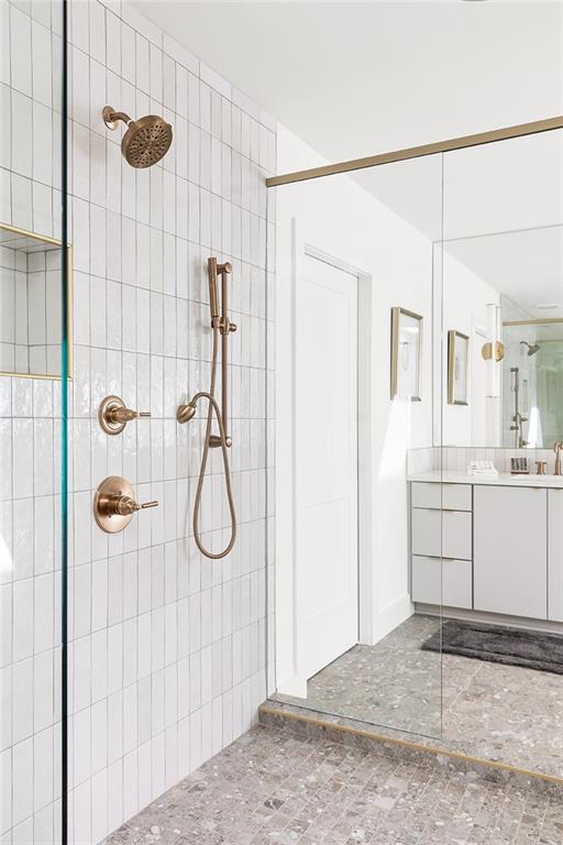 1205 Holly Street Northwest, Unit A Atlanta, GA 30318 - Photo 21 of 74 a bathroom with a granite countertop shower and a sink
