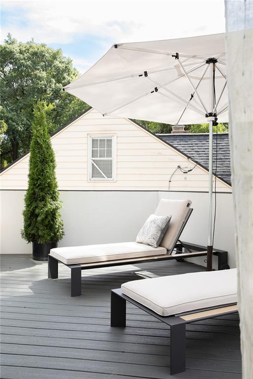 1205 Holly Street Northwest, Unit A Atlanta, GA 30318 - Photo 31 of 74 a white bath tub sitting next to a white building