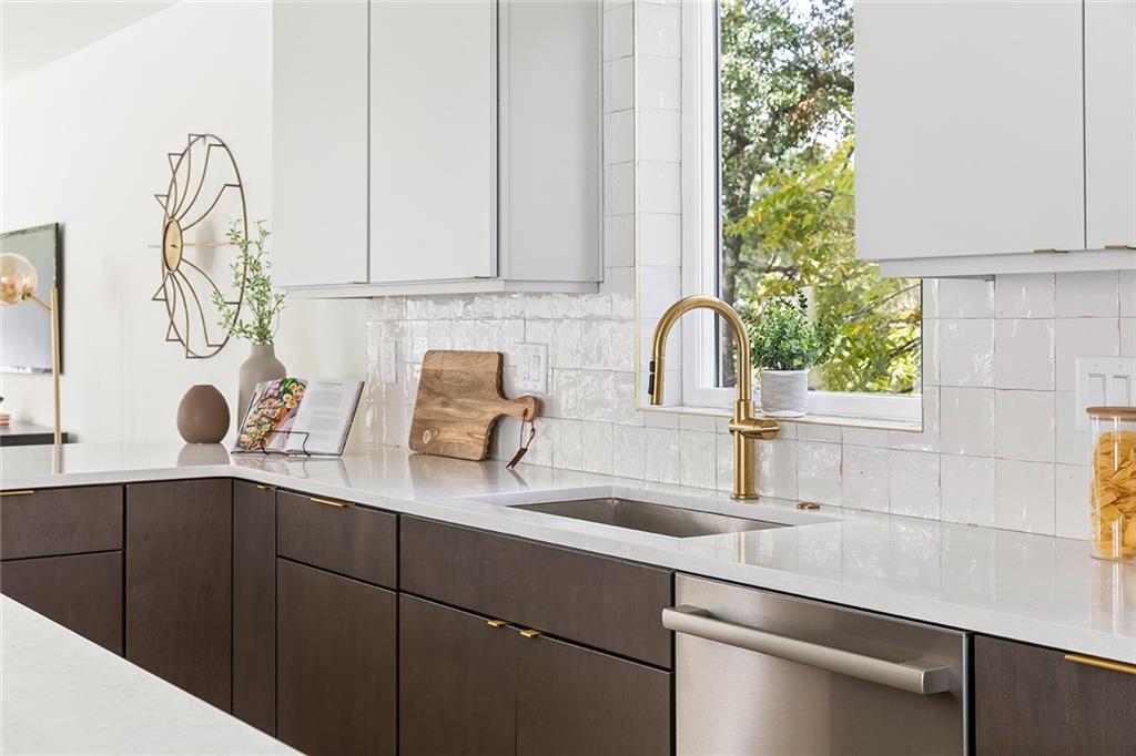 1205 Holly Street Northwest, Unit A Atlanta, GA 30318 - Photo 5 of 74 a kitchen with a sink and cabinets