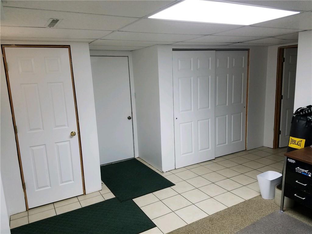 592 Herman Road Butler, PA 16002 - Photo 22 of 24 Shoe closet and easy to clean tile. Access to garage and mechanical closet.