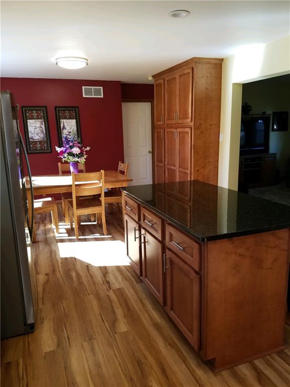 592 Herman Road Butler, PA 16002 - Photo 9 of 24 New flooring in kitchen as well. HUGE pantry closet with pull out drawers and storage galore. Access to master bedroom on other end of kitchen.