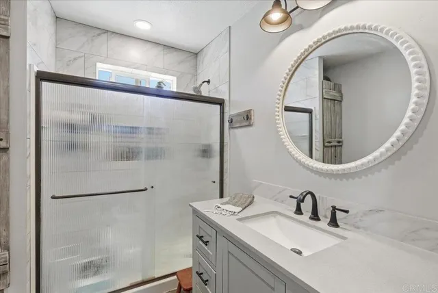 a view of a kitchen with furniture and window