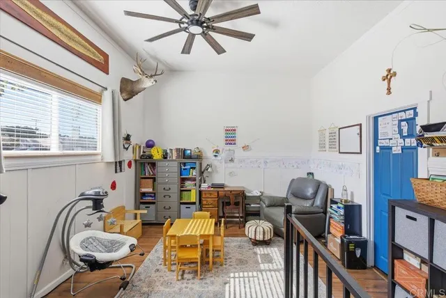 a backyard of a house with yard fire pit and outdoor seating