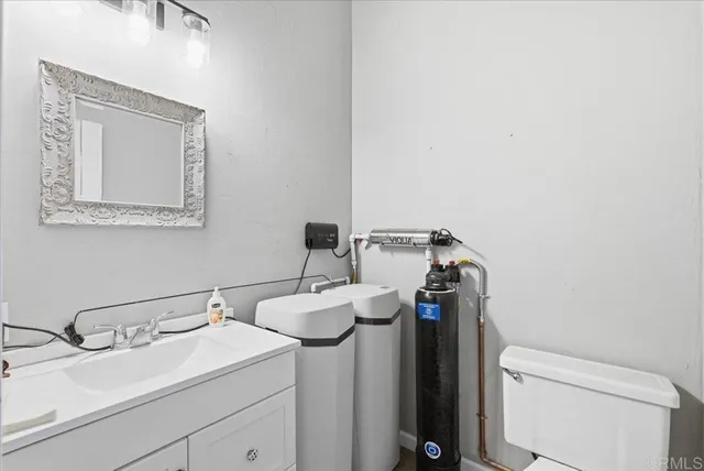 an aerial view of a houses with a yard