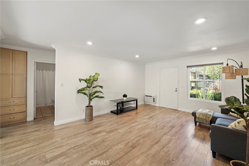63 Streamwood Irvine, CA 92620 - Photo 6 of 36 Crown molding, LED recessed lighting, and fresh interior paint