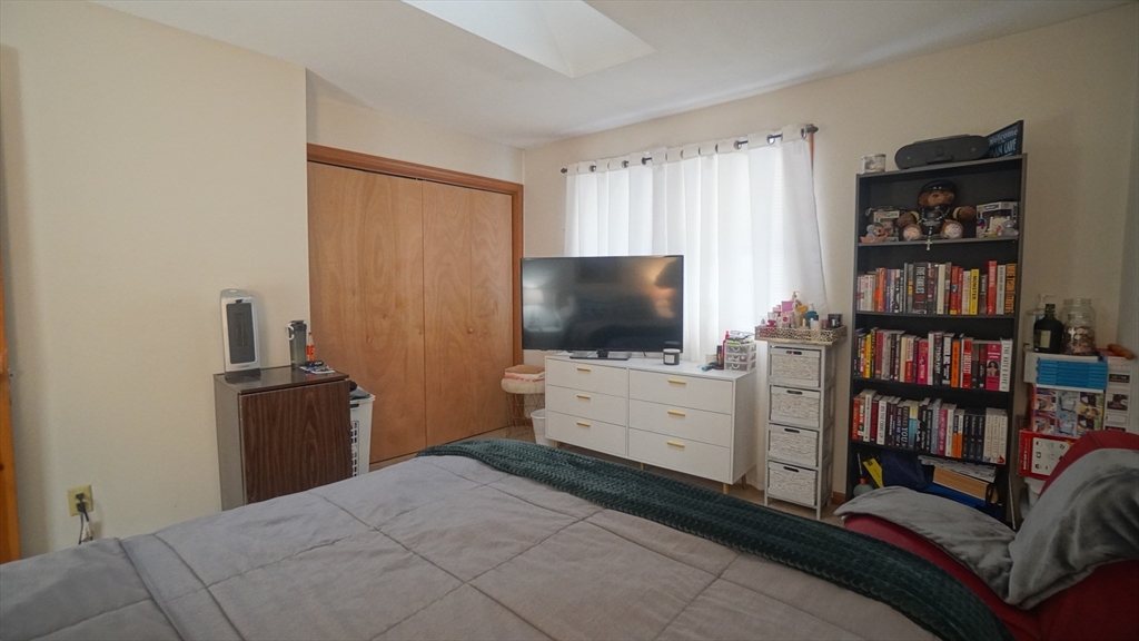 120 Lamplighter Lane, Unit C Springfield, MA 01119 - Photo 15 of 18 a bedroom with a bed and furniture