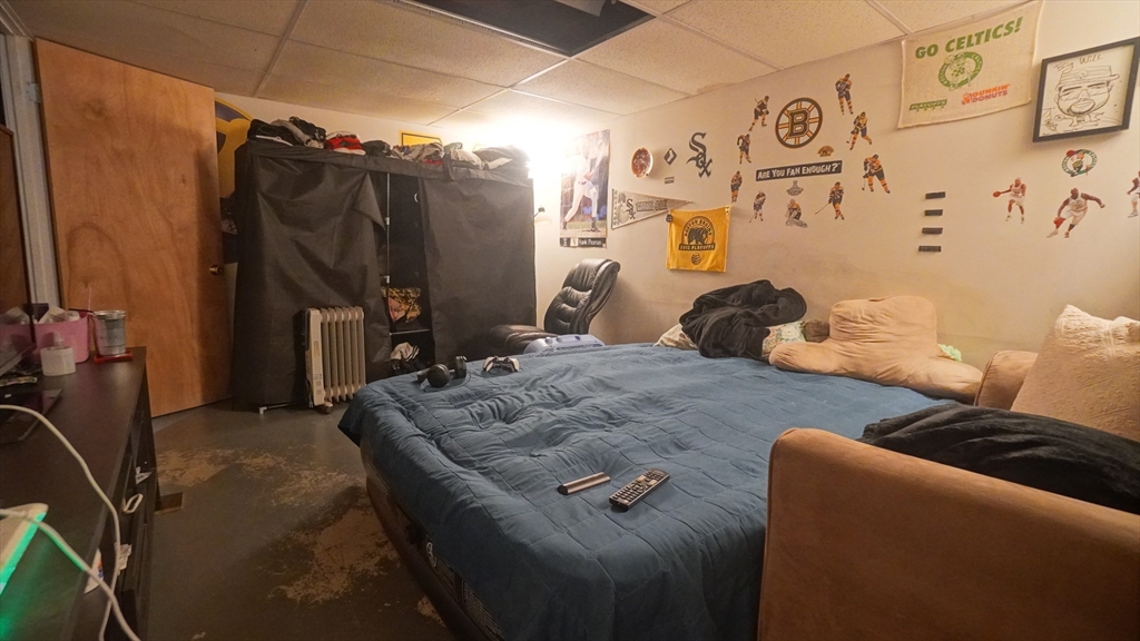 120 Lamplighter Lane, Unit C Springfield, MA 01119 - Photo 18 of 18 a bedroom with a bed and a walk in closet