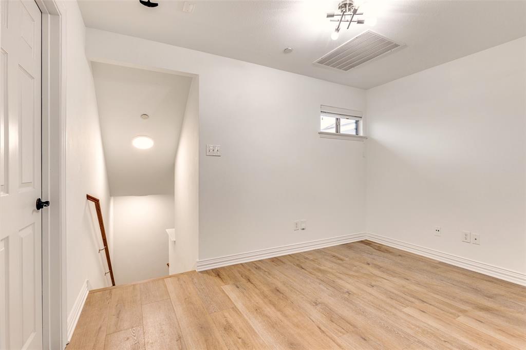 5713 Butterfly Way Fairview, TX 75069 - Photo 22 of 32 wooden floor in an empty room