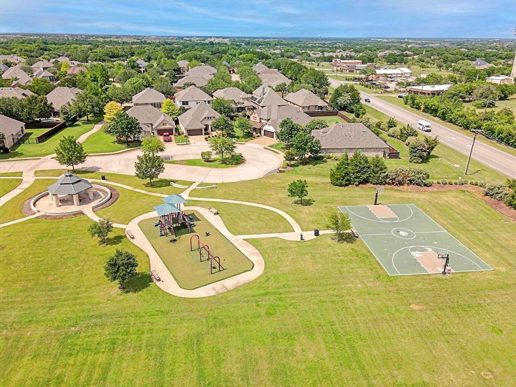 5713 Butterfly Way Fairview, TX 75069 - Photo 25 of 32 an aerial view of residential houses with outdoor space