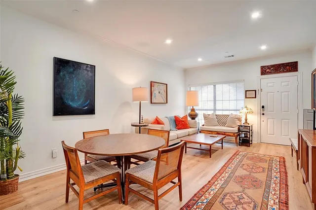 a workspace with furniture and wooden floor