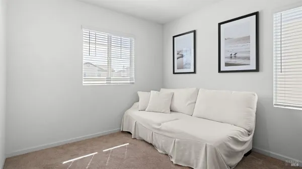 a room with a bed and a window