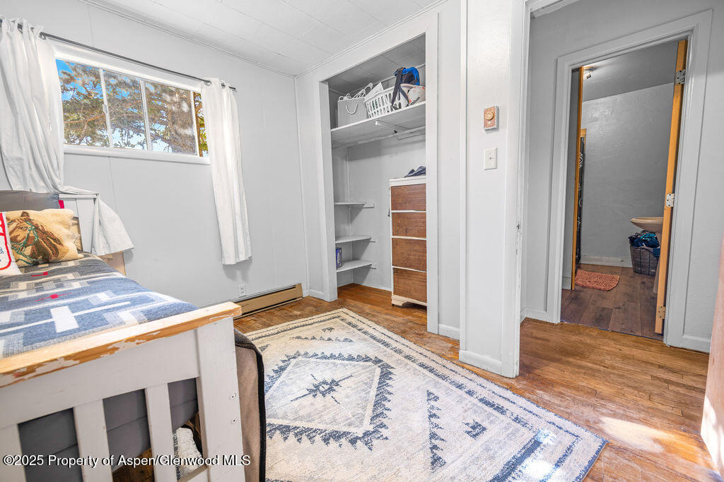 3362 County Road 7 Craig, CO 81625 - Photo 29 of 36 a bedroom with a bed and the view of bathroom