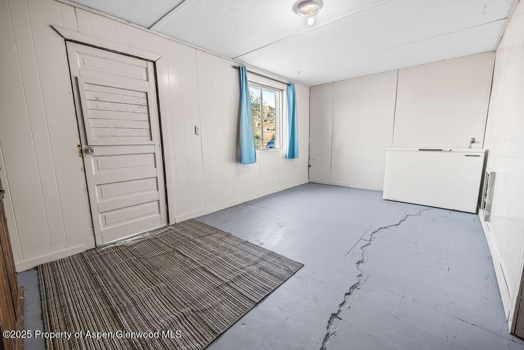 3362 County Road 7 Craig, CO 81625 - Photo 31 of 36 an empty room with windows and closet