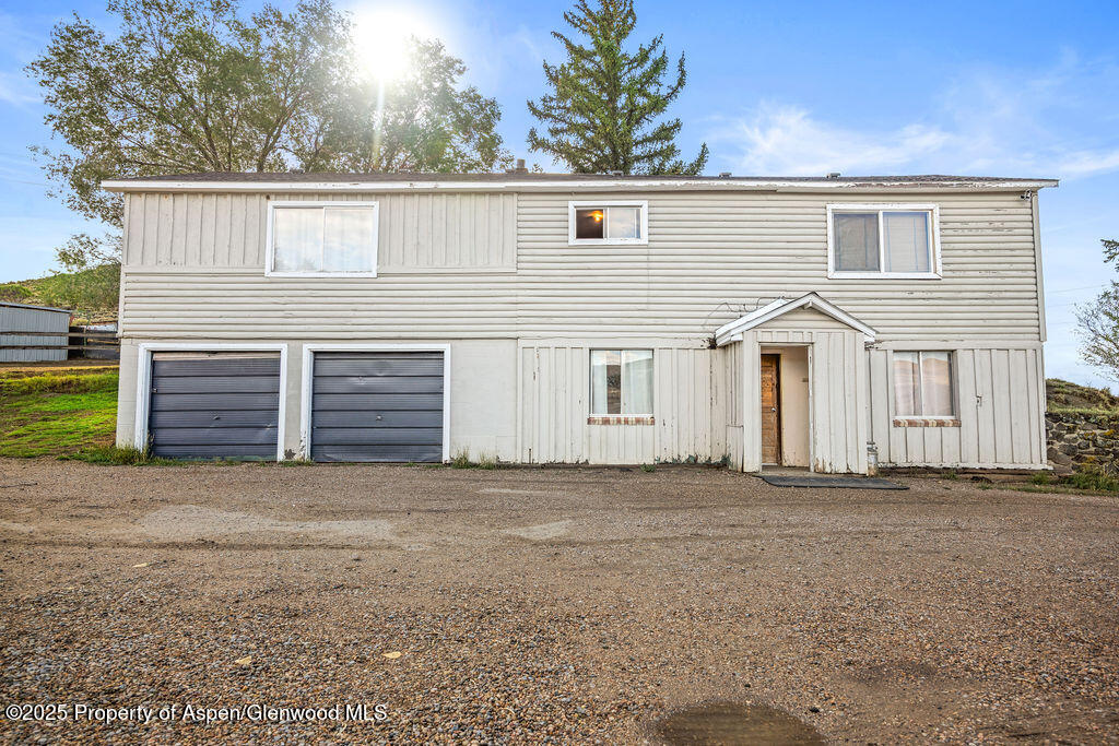 3362 County Road 7 Craig, CO 81625 - Photo 10 of 36 a view of a house with a yard