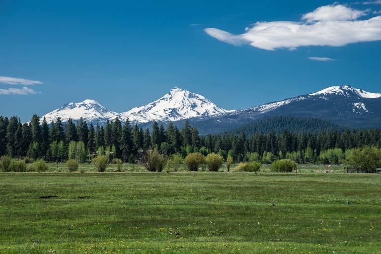 13759 Partridge Foot, Unit RR76 Black Butte Ranch, OR 97759 - Photo 22 of 31 View of the Three Sisters from Black Butte Ranch Meadow