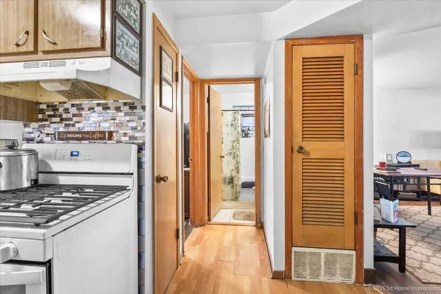 a view of kitchen and utility room
