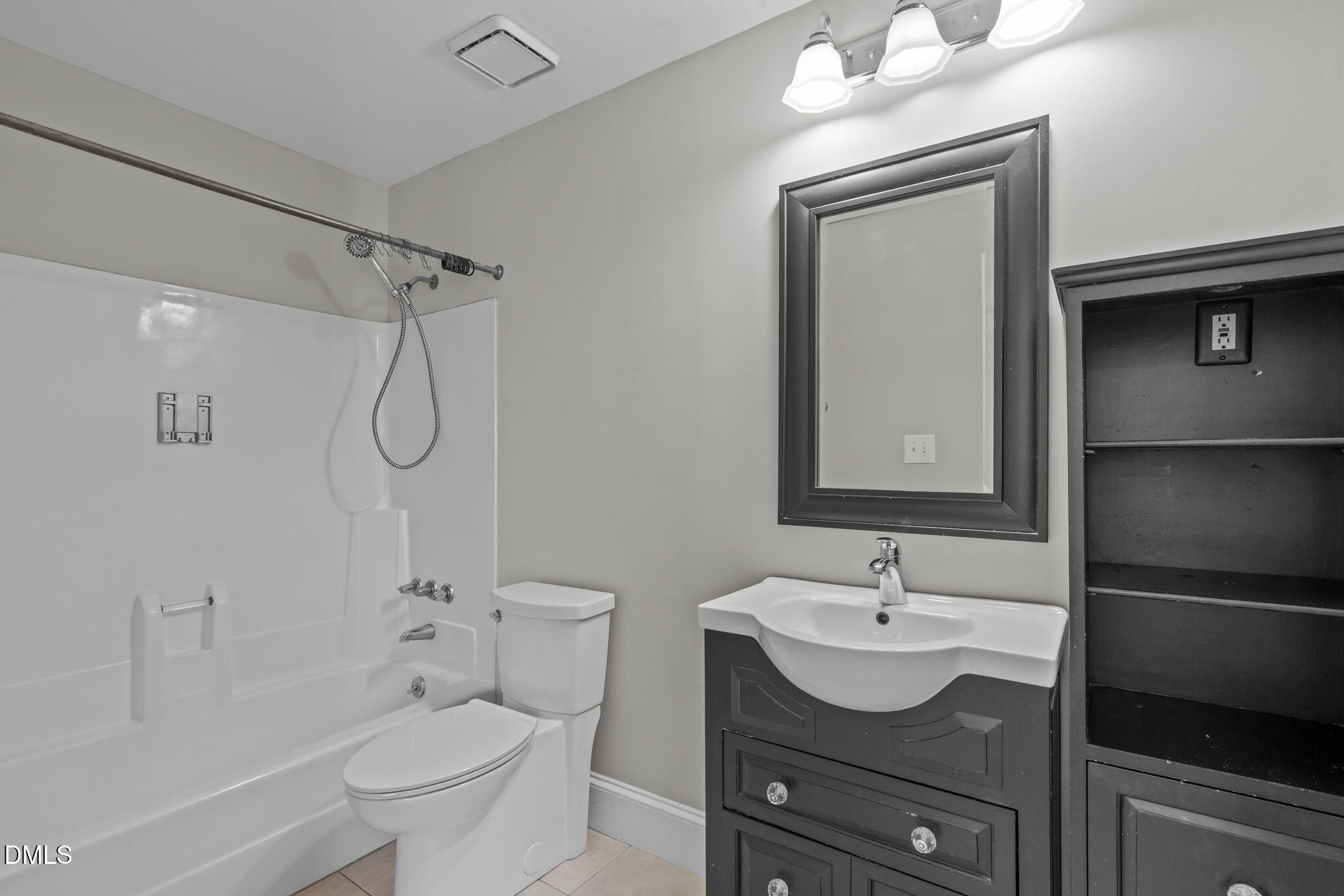 2208 Stafford Avenue Raleigh, NC 27607 - Photo 18 of 30 a bathroom with a sink toilet and shower