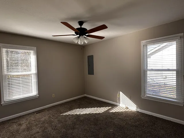 a view of an empty room and window