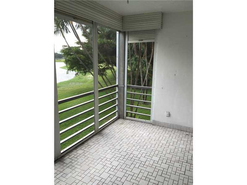 3150 North Course Lane, Unit 203 Pompano Beach, FL 33069 - Photo 10 of 11 Patio/Deck