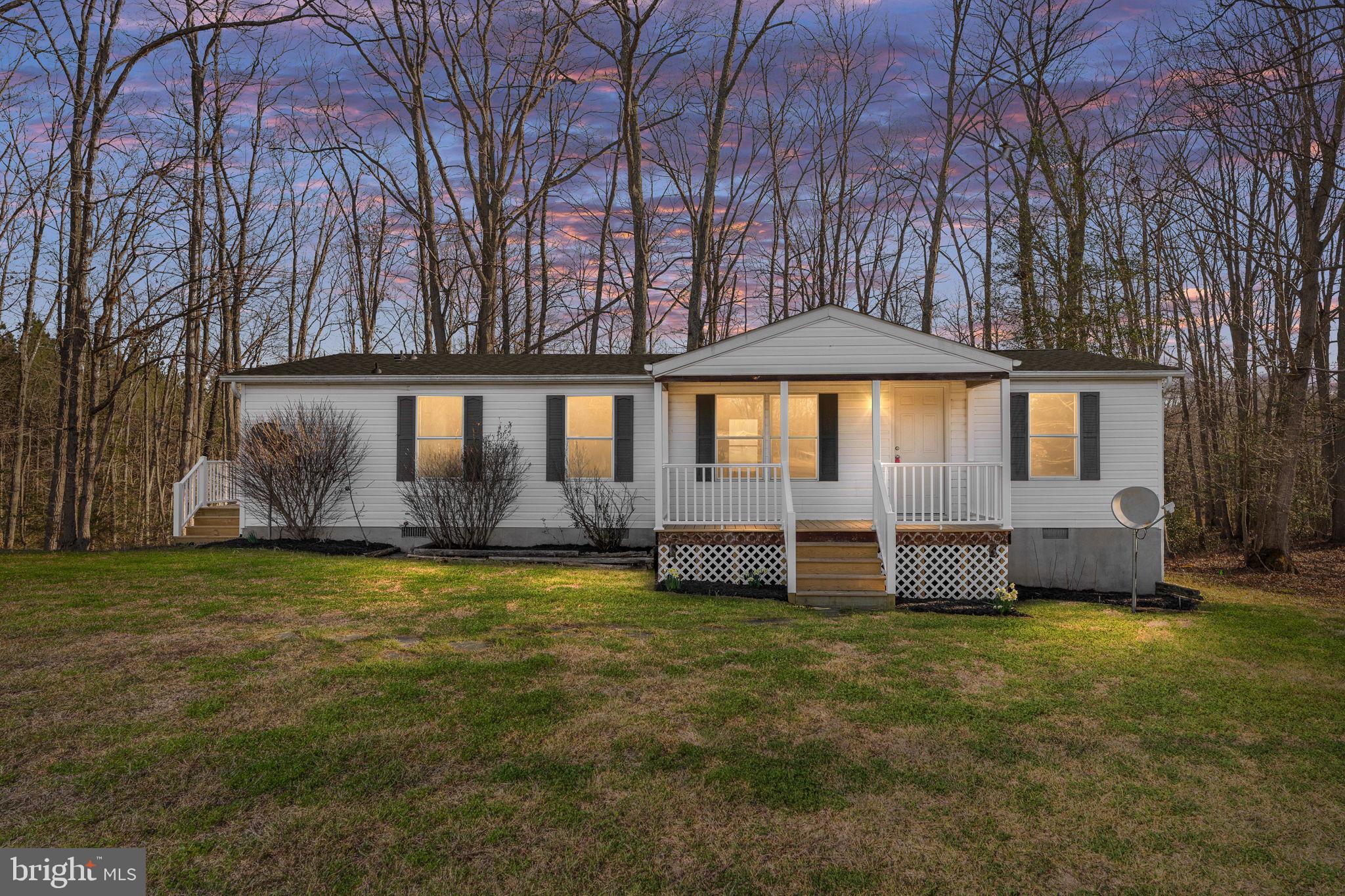 Charming home nestled in serene woods.