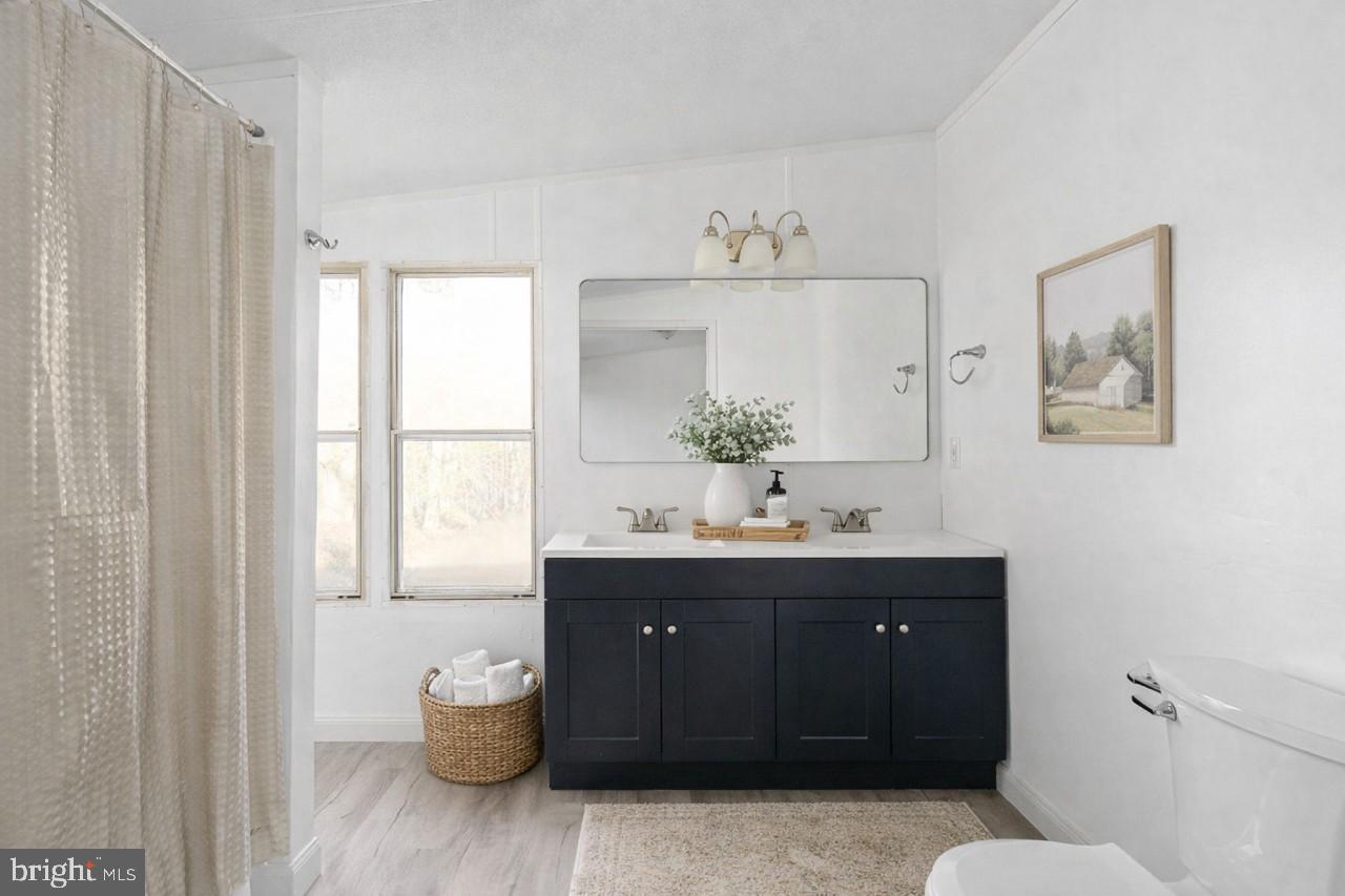 14227 Springfield Lane King George, VA 22485 - Photo 11 of 22 Serene bathroom with natural light.