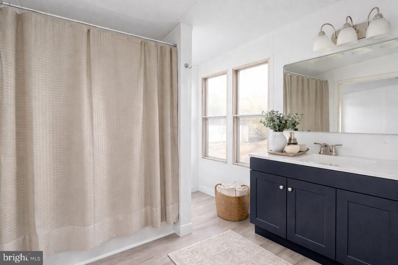 14227 Springfield Lane King George, VA 22485 - Photo 12 of 22 Serene bathroom with natural light.